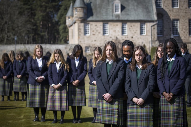 Pupils at the Duke of Edinburgh's former school, Gordonstoun in Moray, observe the one minute silence on the day of his funeral. Picture: PA Wire