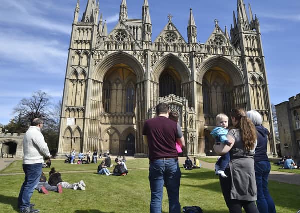 People gathered to observe a minute's silence in the Cathedral Precincts in memory of the Duke of Edinburgh. Picture: David Lowndes