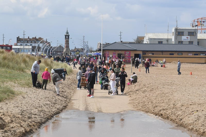 Rain can't stop visitors heading to beach in Skegness over May bank holiday weekend. ANL-210405-134112001