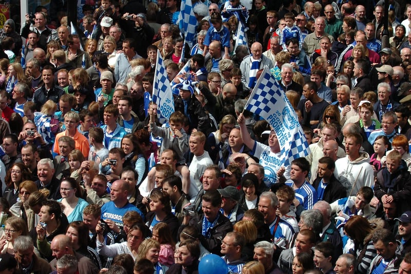 Peterborough United fans celebrate in 2009.
