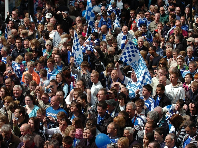 Peterborough United fans celebrate in 2009.