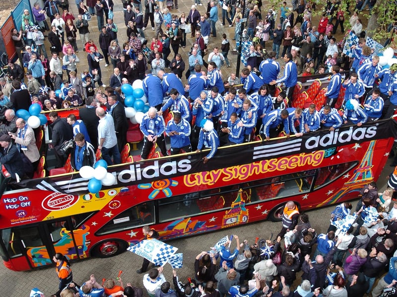 Peterborough United fans celebrate in 2009.