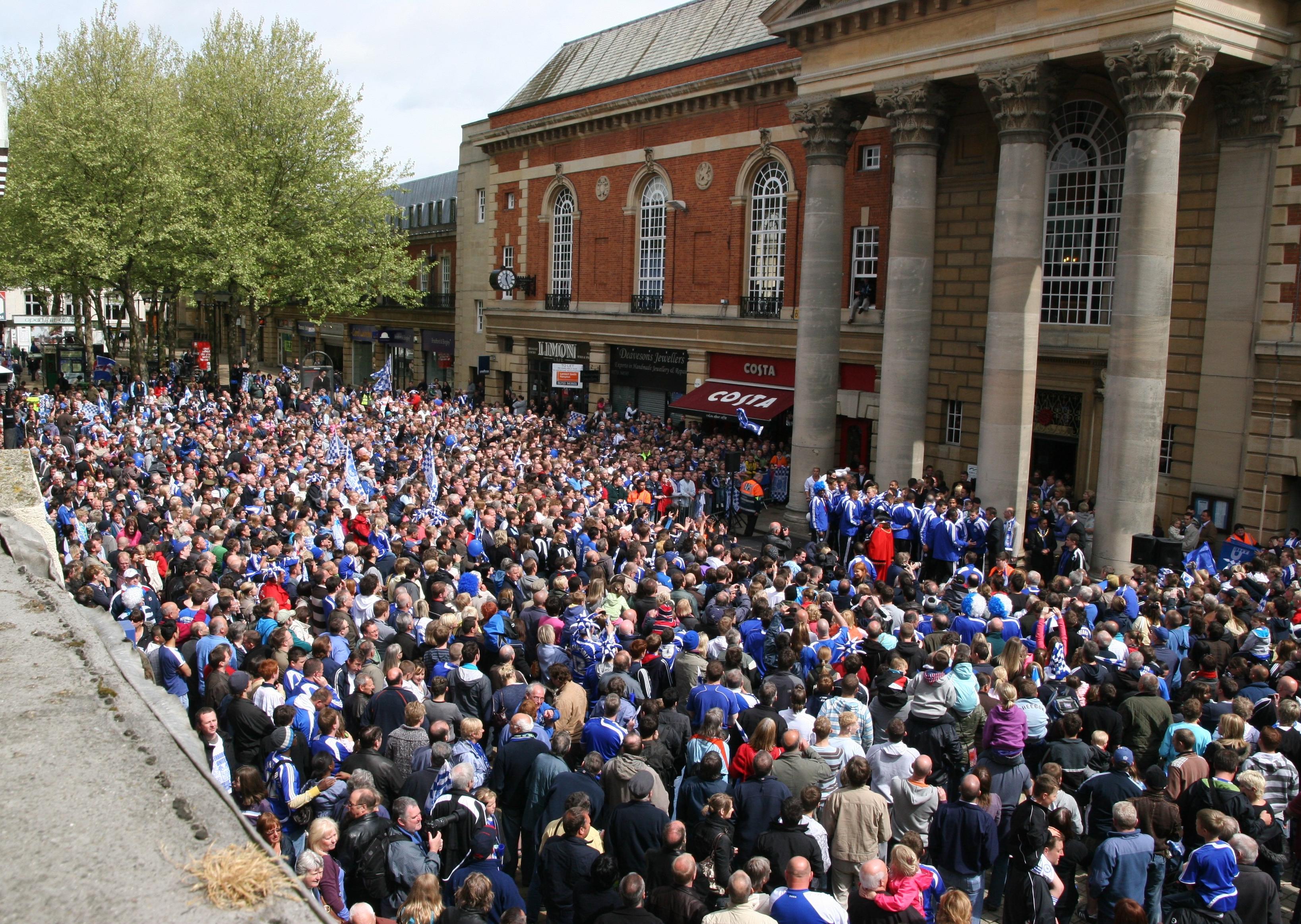 Peterborough United fans celebrate in 2009.
