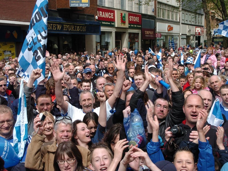 Peterborough United fans celebrate in 2009.