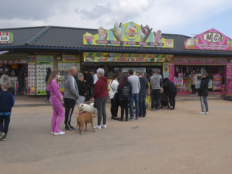Visitors queue for refreshments at kiosks in Skegness over May bank holiday weekend. ANL-210405-134050001
