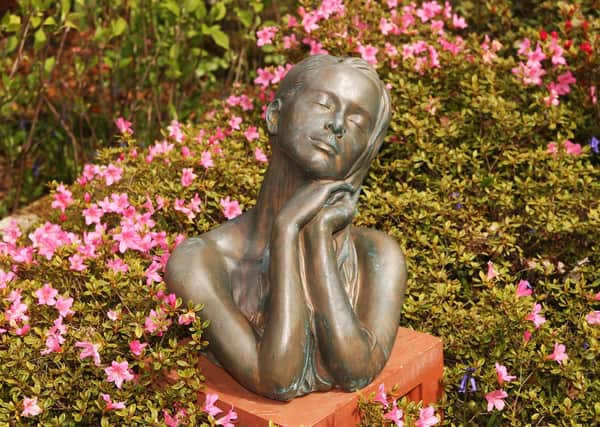 Christine Baxter's sculpture Sunworshipper at Borde Hill Garden, near Haywards Heath. Photograph: Derek Martin/ dm21050121a