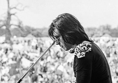 A view from the stage showing the crowd as Bryan Ferry of Roxy Music performs. It was the band's first festival appearance and only their 7th show. (Photo by Brian Cooke/Redferns)