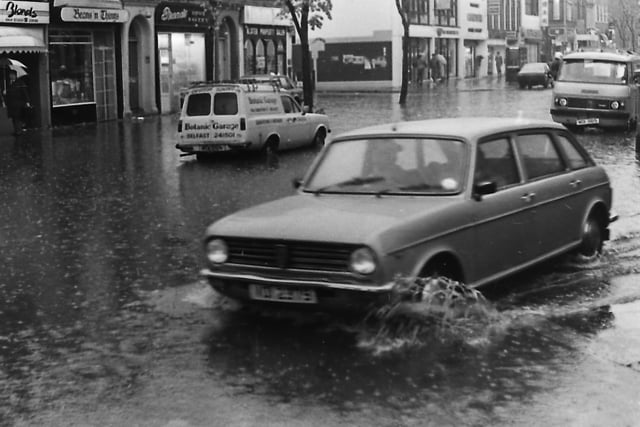 Traffic crawls through Belfast in October 1987 after torrential rain lashed Northern Ireland causing blocked roads and flooded homes. Picture: News Letter archives