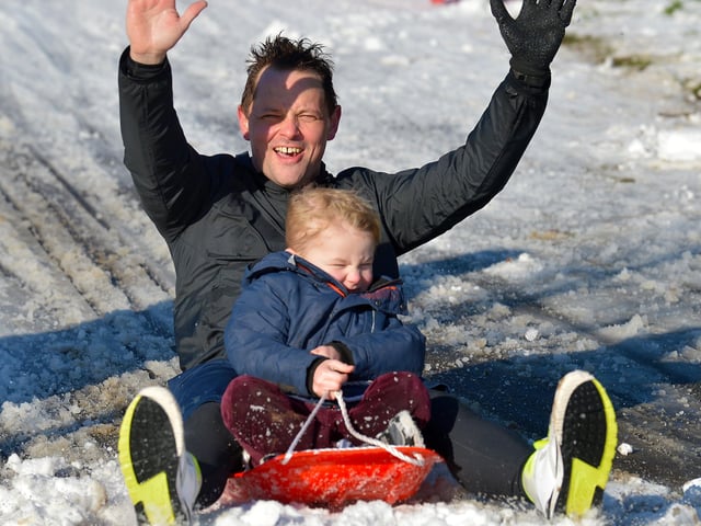 Having fun on a snow covered Brooke Park on Saturday afternoon last. Photo: George Sweeney / Derry Journal. DER2104GS – 023