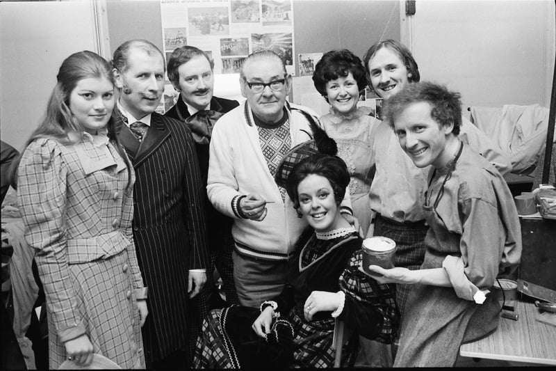 Principals in the Derry Amateur Operatic Society's presentation of 'Hello Dolly' being 'made up' by Eddie Friel before the opening performance at Clondermot Secondary School. Sitting centre is June-Anne Baxter, who had the principal role of Mrs Dolly Gallagher Levi, with, from left, Carol King, Donald Hill, Wilson Kerr, Noreen McCrudden, Alan Hazlett and Ken Canning.
