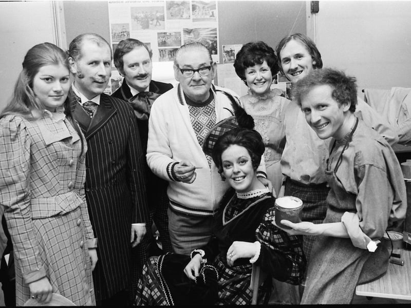 Principals in the Derry Amateur Operatic Society's presentation of 'Hello Dolly' being 'made up' by Eddie Friel before the opening performance at Clondermot Secondary School. Sitting centre is June-Anne Baxter, who had the principal role of Mrs Dolly Gallagher Levi, with, from left, Carol King, Donald Hill, Wilson Kerr, Noreen McCrudden, Alan Hazlett and Ken Canning.