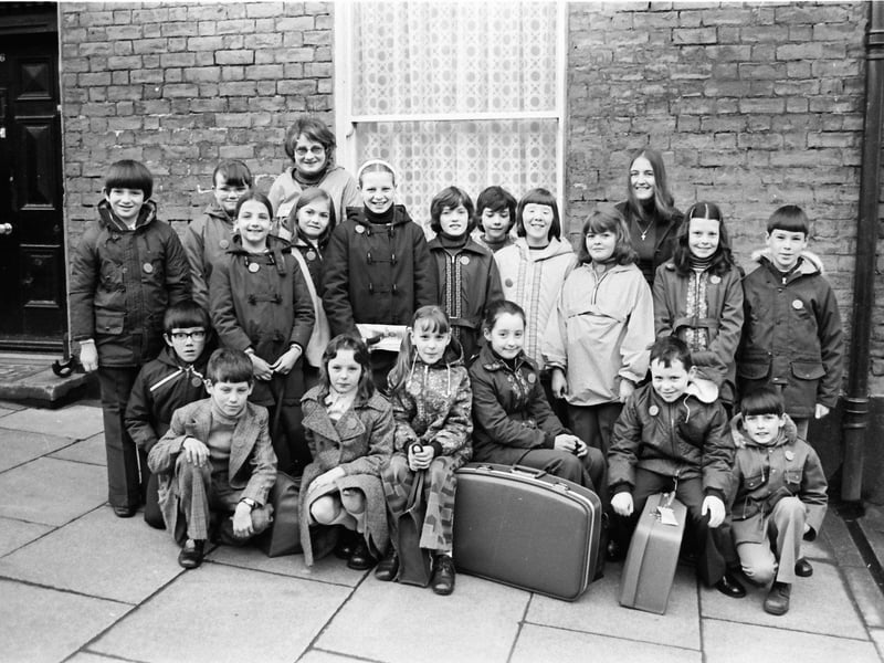 Group of schoolchildren from Derry pictured before leaving the city for a holiday in Taunton, Somerset, organised by Holiday Projects, Derry. At back are escorts, Majella Flood (left) and Yvonne Coyle.