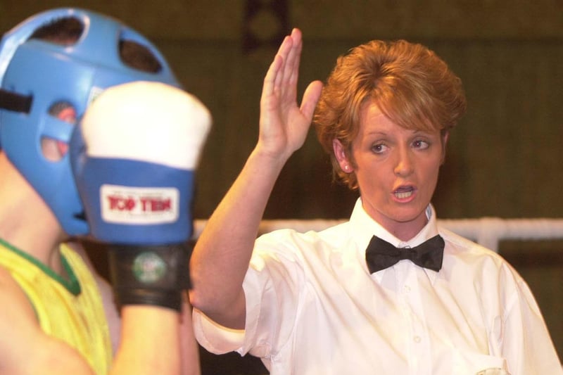Referee, Sadie Duffy administers a public warning to Gary McCafferty during his bout with Gerard Doherty at the Strand Hotel.