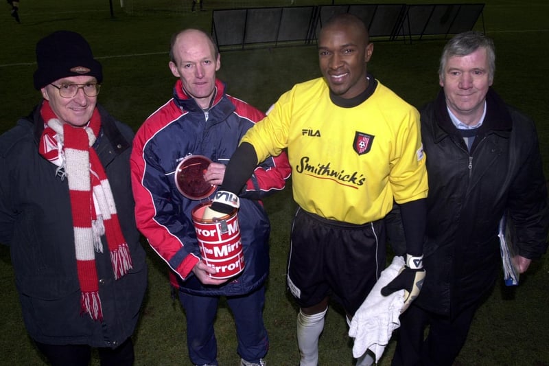 Derry City keeper, Russell Payne making the Derry City F.C. Monthly Draw at Brandywell. Included are Andrew Doherty, Pat Gillen and George Caldwell.