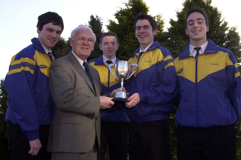 Mr Andy McClea pictured with members of the St Columb’s College swimming team, winners of the Ulster Schools Senior title and runners-up in the All Ireland.