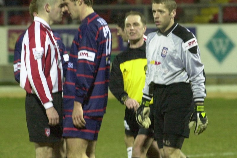 Derry City’s Sean Hargan confronts St Pat’s Jamie Harris after the final whistle as the match referee Pat Whelan moves in to control the situation.