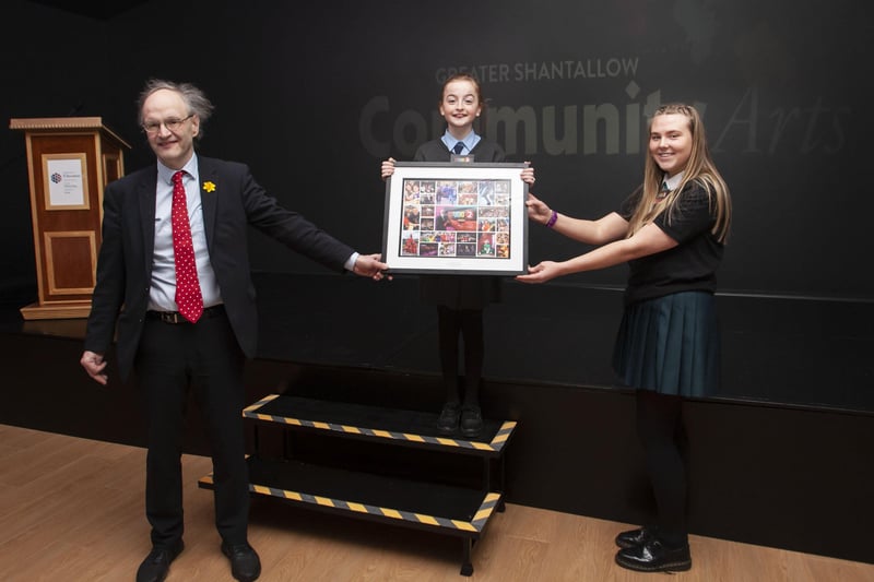 Education Minister Peter Weir is presented with a special memento by Molly McGee and Holly Bonner during Wednesdayâ€TMs  official opening of the newly refurbished Studio 2 Youth and Community Arts Centre. (Photos: Jim McCafferty Photography)