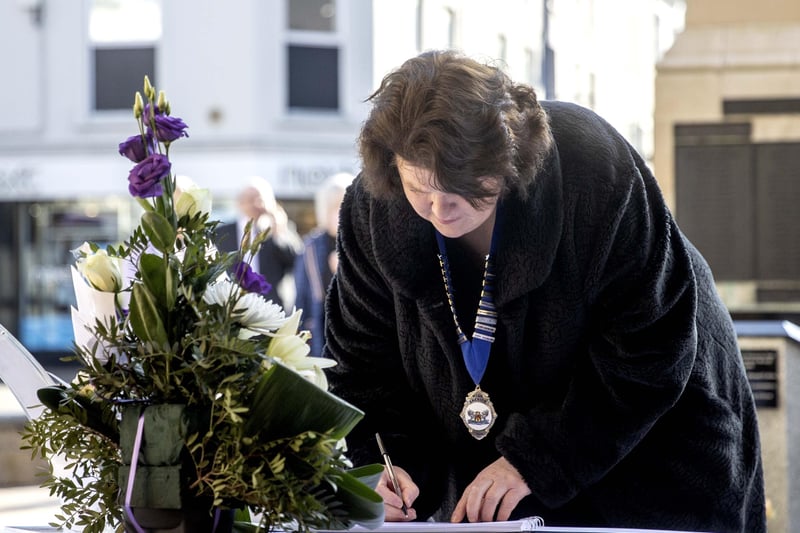 The High Sheriff of County Londonderry Paula McIntyre leaves her message in the Book of Condolence for His Royal Highness Prince Philip Duke of Edinburgh at Coleraine Town Hall