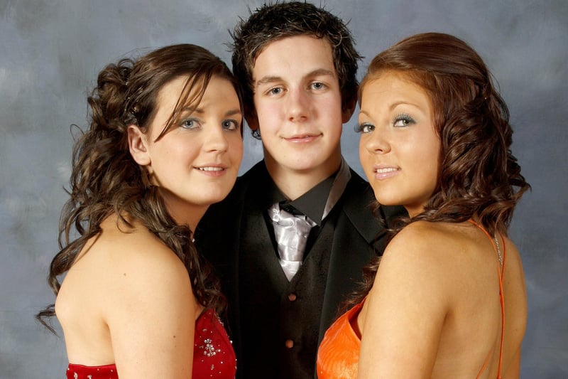 THREE'S COMPANY...Stuart Millar pictured with Lyndsey Maguire and Nicole Boyd during the Coleraine Inst formal at the Royal Court Hotel. CR4-221PL