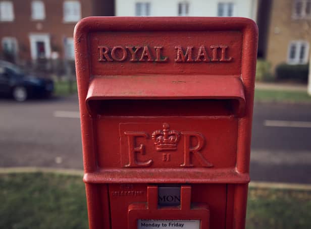 <p>A general view of a Royal Mail postbox</p>