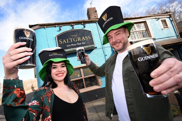 Saltgrass landlord Walter Veti and bar manager Abbie Jobing celebrate St Patrick's Day.