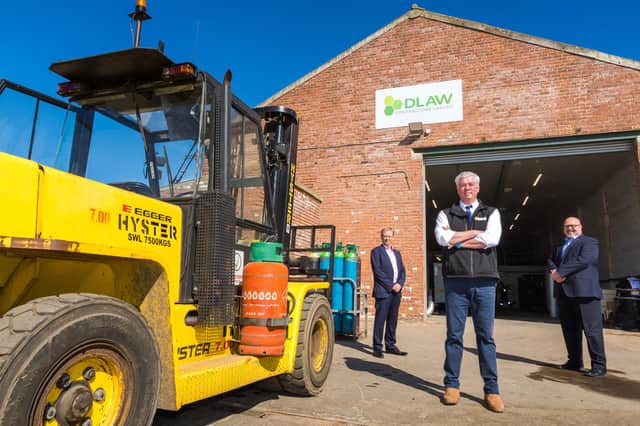 DLAW has expanded its footprint at Port of Sunderland. Dale Barry, managing director of DLAW, is pictured centre with Matthew Hunt, director at the Port of Sunderland, left, and Councillor Graeme Miller, the chair of Port of Sunderland.