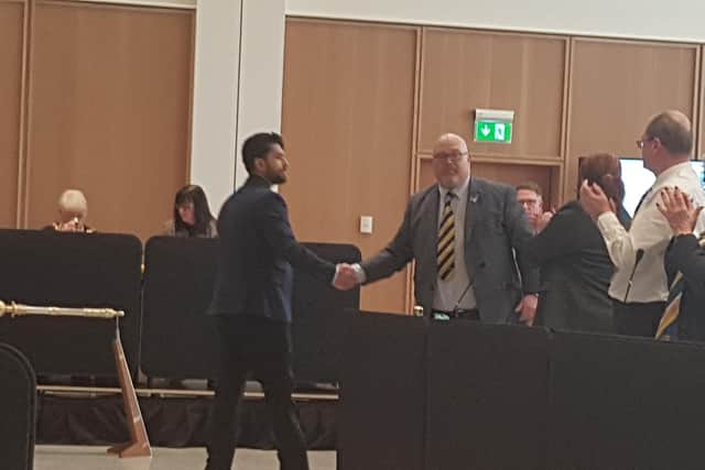 Cllr Ali shakes hands with Sunderland Labour Group leader Councillor Graeme Miller.