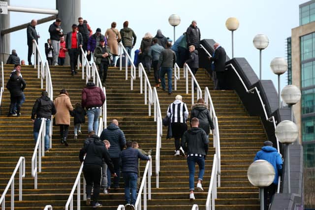Newcastle United fans arrive at St James's Park for a game in 2019.
