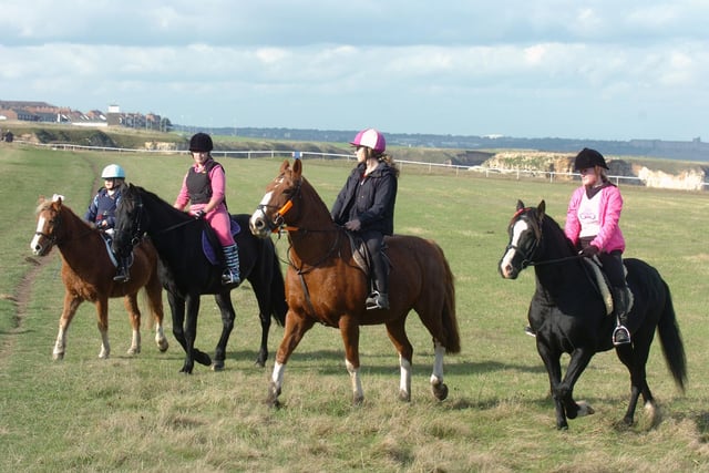 Billy Huthart, Kiera Nielson, Charlotte Williamson and Toni Hackridge (from left to right) taking part in a charity horse ride along the coastline from Whitburn in aid of Cancer Research UK in 2010.