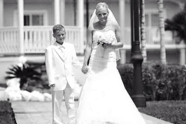 Jack walking his mum down the aisle.