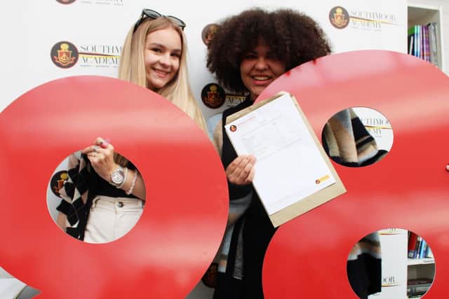Nieve Howat (left) and Estelle Onwuka, both 16, celebrate attaining grade 8s and 9s in their GCSES.