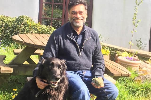 Professor Poorna Gunasekera with dog Barney after returning from hospital where he spent 11 days battling Covid-19