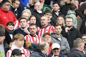 Sunderland fans in action at the Stadium of Light as the Black Cats defeat Wigan Athletic 2-1 in the Championship.