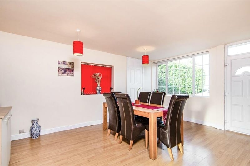 The large dining room offers plenty of space for family meals or entertaining friends