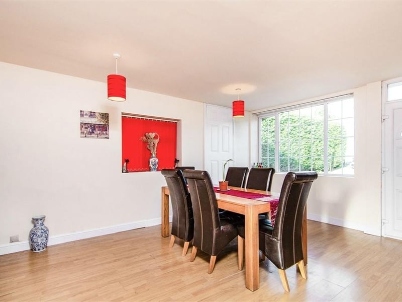 The large dining room offers plenty of space for family meals or entertaining friends
