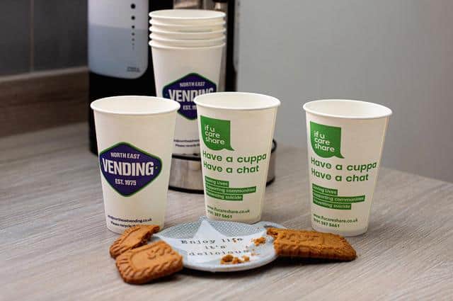 North East Vending cups with If U Care Share Foundation branding
