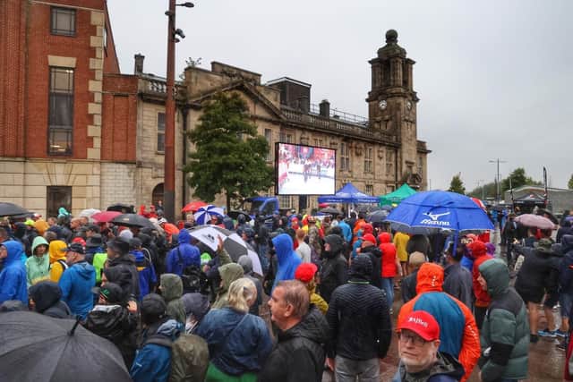 Supporters defy the weather to pack into Keel Square