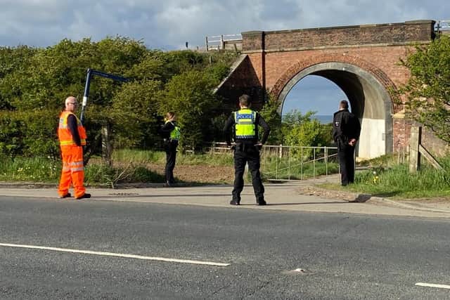 Police and Network Rail attending the scene at the railway line near Blackhall where a wartime bomb has reportedly been discovered. Picture by Frank Reid.