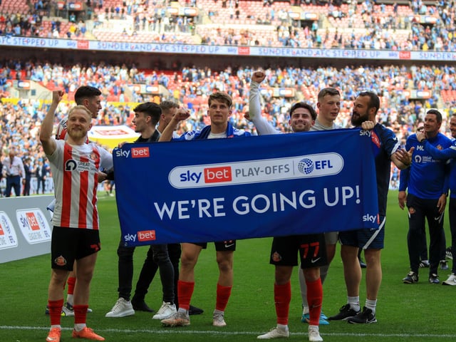 Sunderland players celebrate their win after a long season