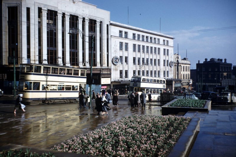 High Street showing (left) Peter Robinson Ltd., fashion department store (Nos.51-57) and (right) C and A, department store, (Nos.59-65), 1957