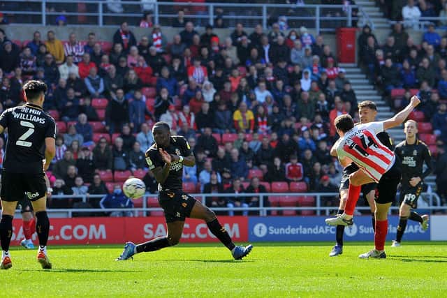 Ross Stewart scores his second goal against Cambridge United