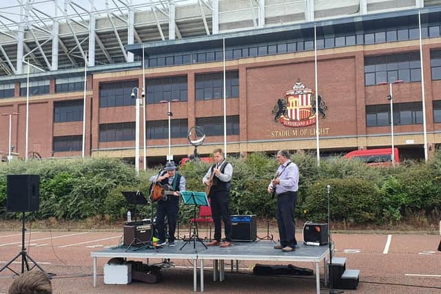 The drive-in church service took place in the shadows of the Stadium of Light