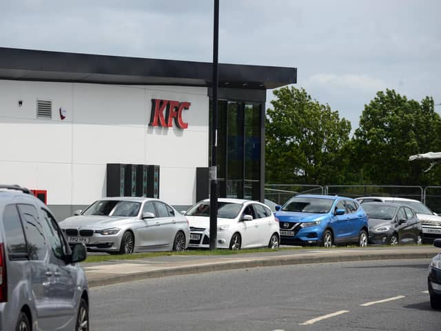 Traffic queuing at the KFC drive-through on the site