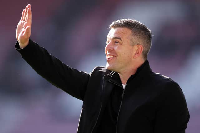 WIGAN, ENGLAND - APRIL 23: Steven Schumacher, Manager of Plymouth Argyle acknowledges the fans after the Sky Bet League One match between Wigan Athletic and Plymouth Argyle at DW Stadium on April 23, 2022 in Wigan, England. (Photo by Lewis Storey/Getty Images)