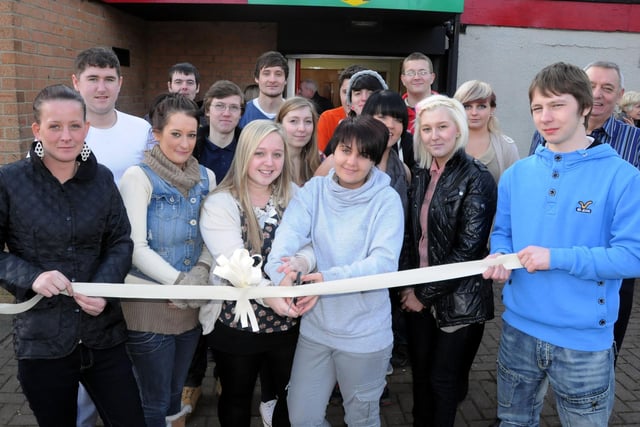 Youngsters from Grindon Young People's Centre celebrate the refurbishment of their premises, which they have all helped to do.
