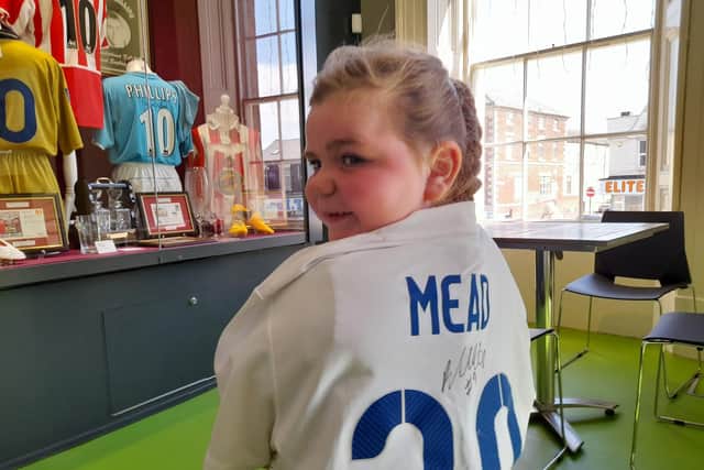 Ioni Leigh Langan, five, in one of Beth Mead's England shirts.