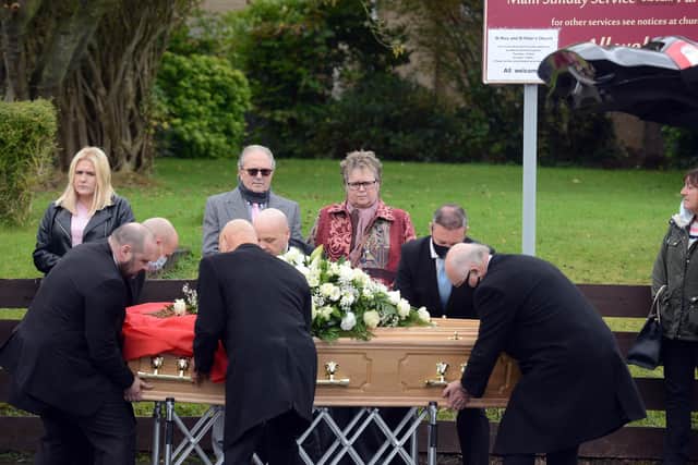 Men were asked to wear suits and people were urged to wear bright colours for the funeral.