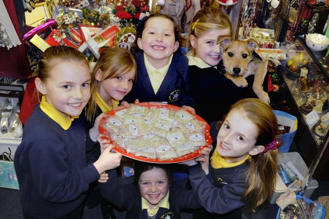 Fulwell Junior School pupils Lucy Archer, Lucy Goodings, Jamie Scrafton, Carys Kemp, Robyn Barker, and Eva Lowes were selling reindeer dust to raise money for Pawz For Thought, in Fulwell Road, Sunderland. They are seen here in the shop with Daizy the dog.