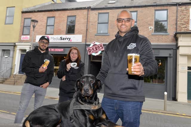 Sunniside's new bar, Diego's Joint specialising in craft ale, teas and coffee. Owner Dan Makaveli with his dog Diego with staff Haythem Tawfiq and Lisa Miller.