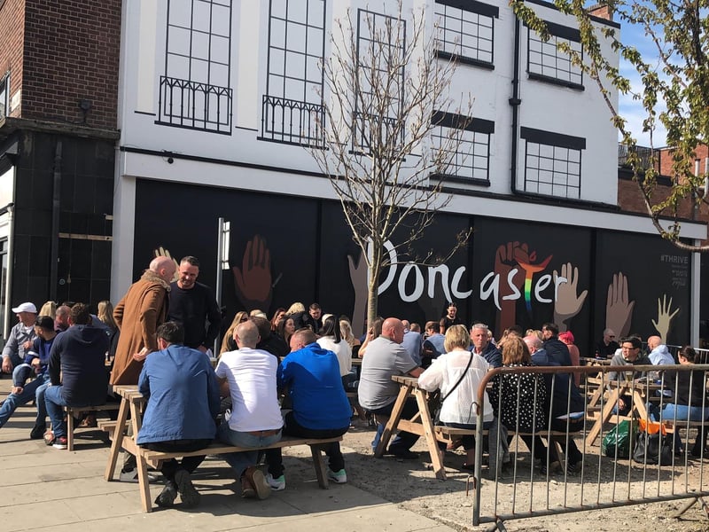 People enjoying a drink at the Hall Cross beer garden.